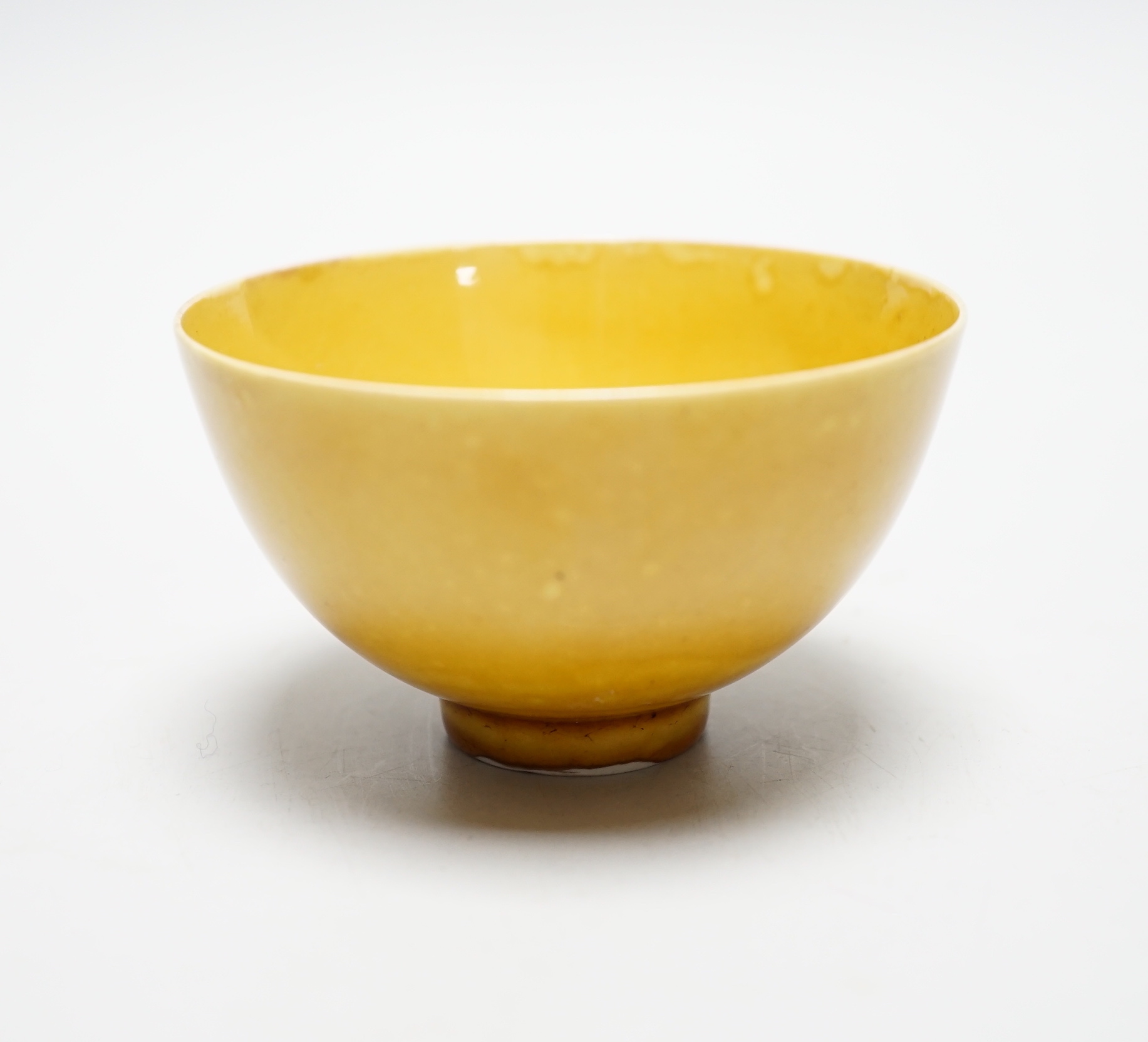 A Chinese yellow glazed tea bowl, 5.5cm